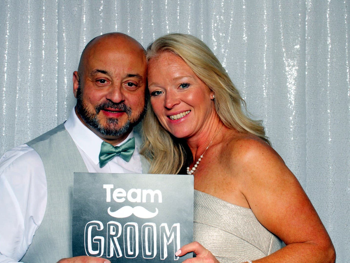 Groom and friends in the photo booth